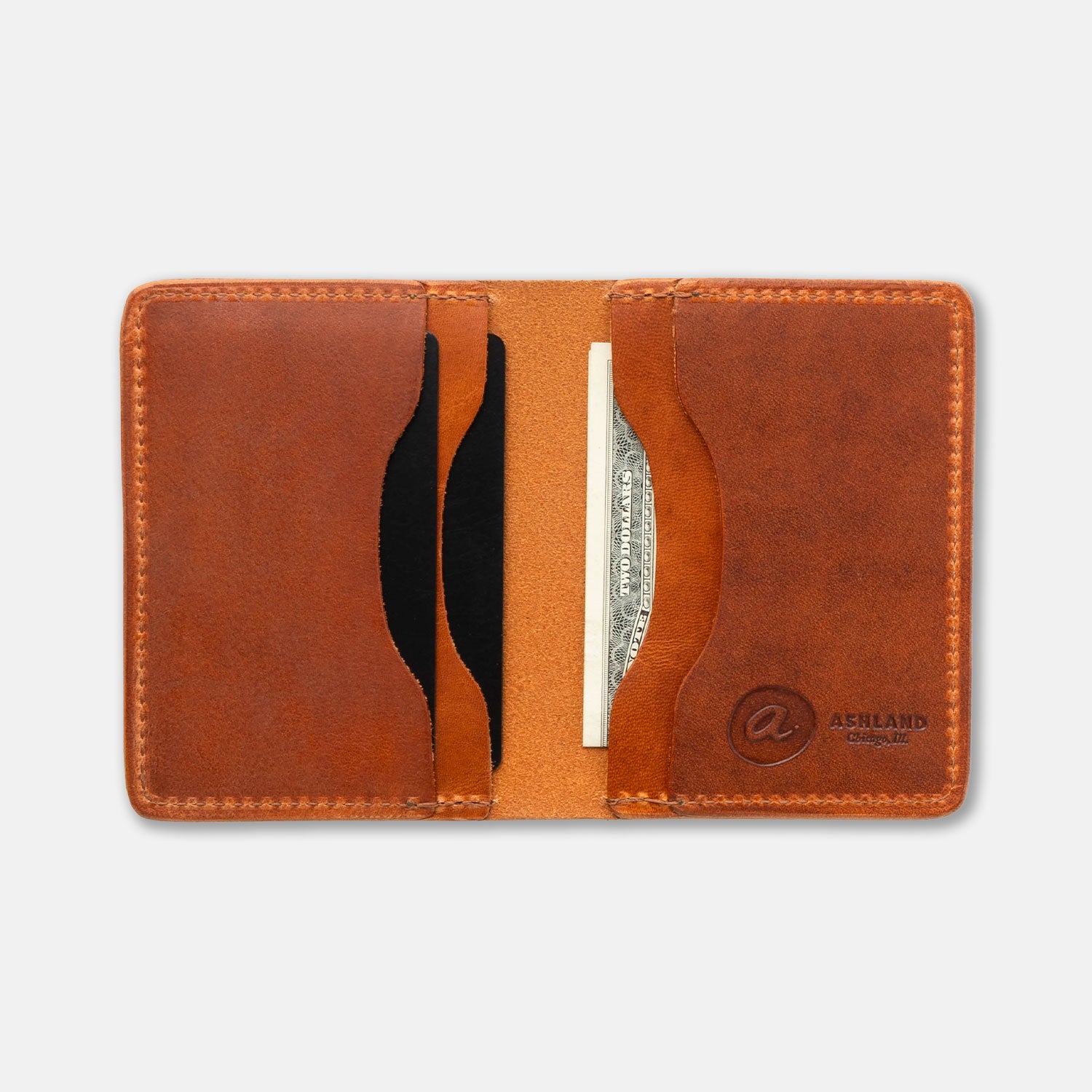 Brown leather wallet with card slots on a light gray background