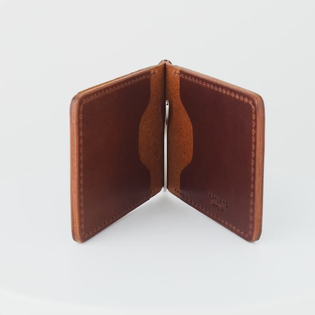 rotating video of brown horween leather capone money clip