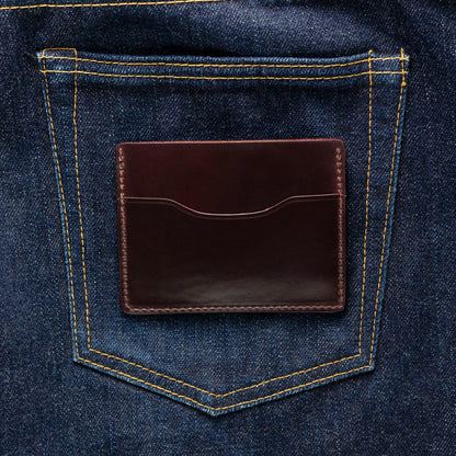 shell cordovan leather wallet on jeans