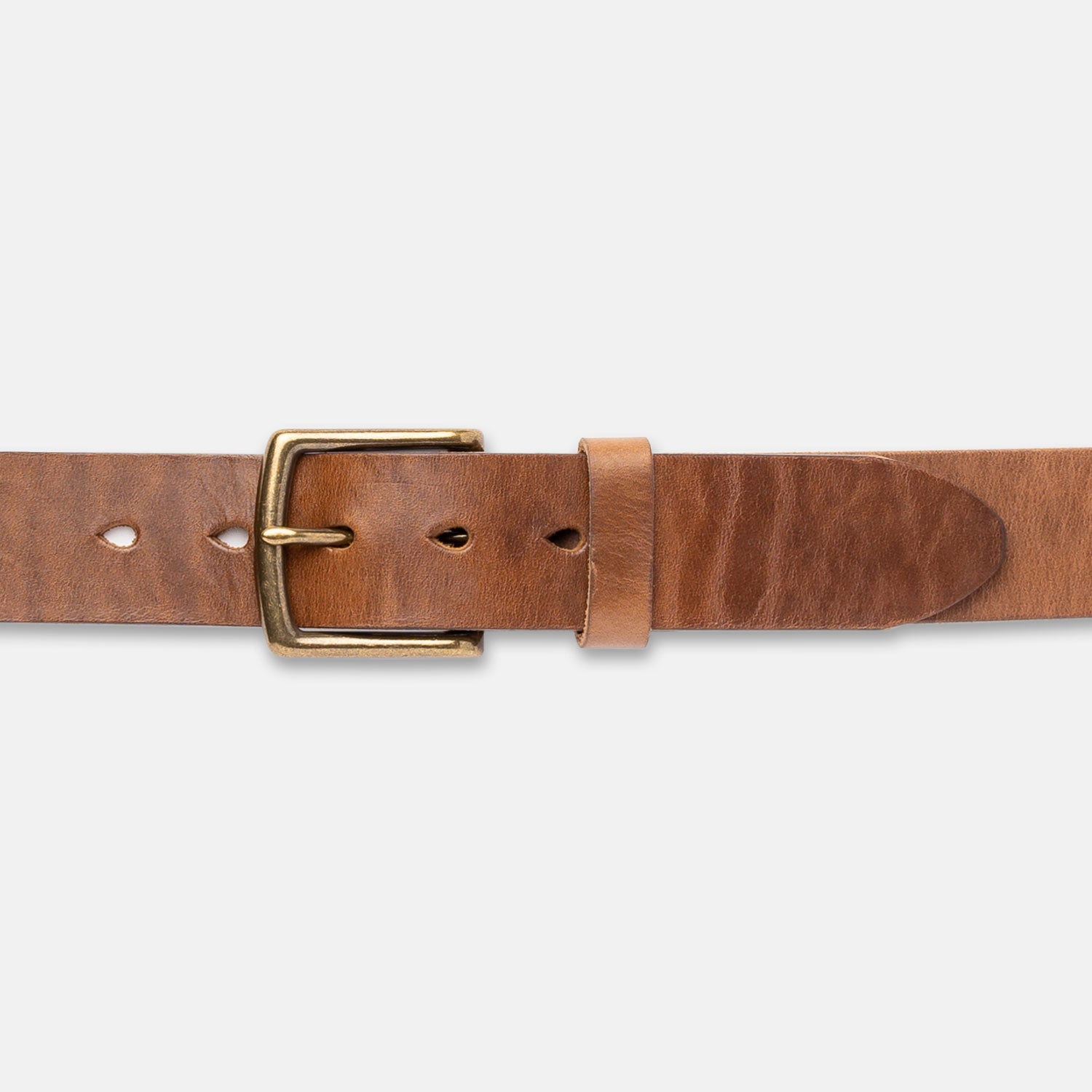 Brown leather belt with a brass buckle on a light gray background