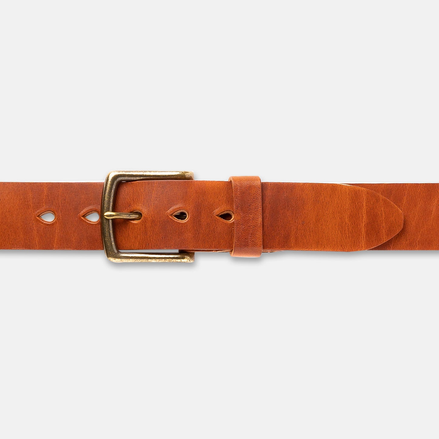 Brown leather belt with a brass buckle on a light gray background